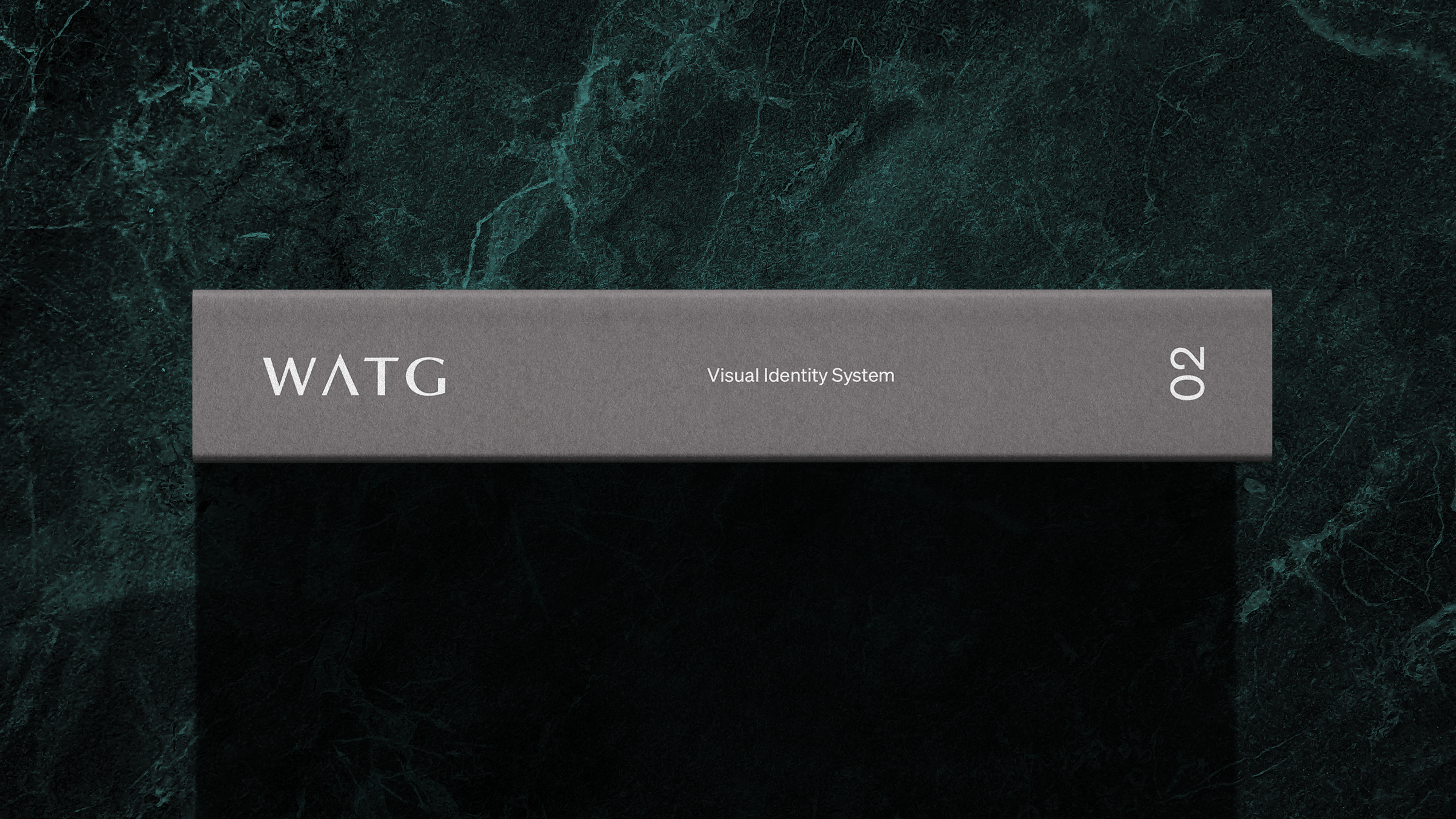 A photo of WATG's Visual Identity System book binding.