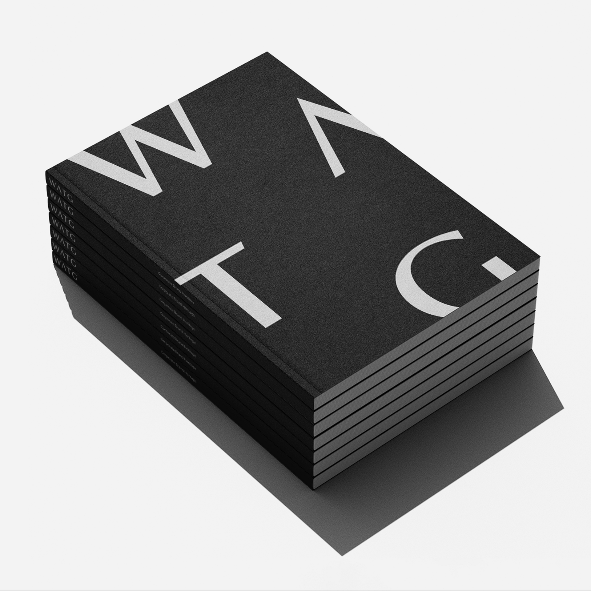 A photo of a stack of WATG notebooks. 